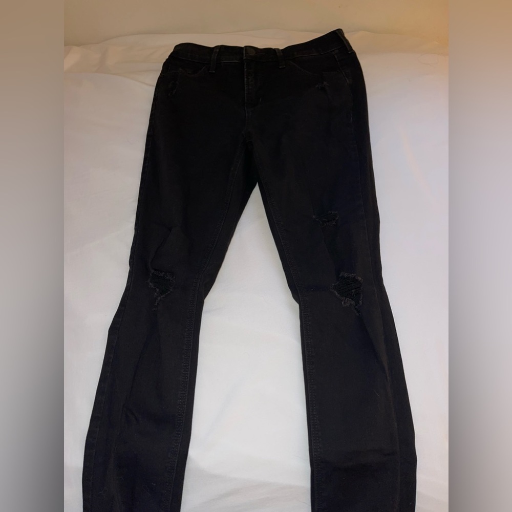 Ripped black skinny jeans